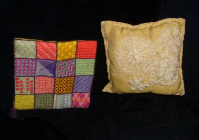 She used a form of lacemaking on the right hand sampler pillow.